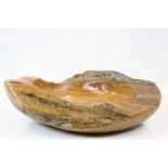 Large carved Wooden fruit bowl of Naturalistic form, with waxed finish, approx 49cm in diameter at