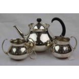 Eric Clements for Mappin & Webb silver plated three piece tea service comprising tea pot, milk jug