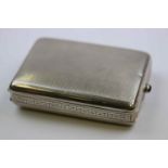 Early 20th century silver three compartment cigarette case, when opened transforming into a two tier