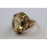 Citrine 9ct yellow gold dress ring, the oval mixed cut citrine measuring approximately 16mm x 11.