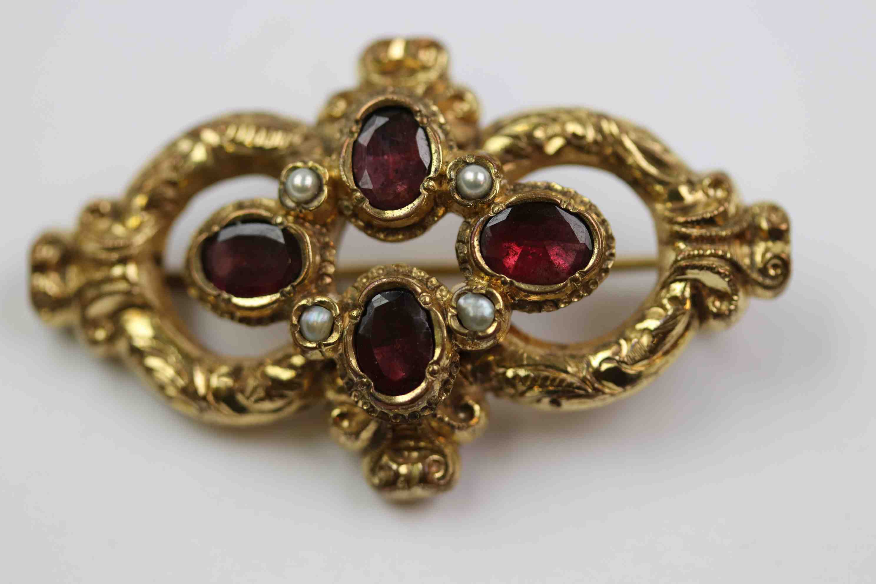 19th century garnet and seed pearl yellow metal brooch, four oval mixed cut garnets in quatre foil - Image 6 of 6