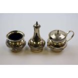 Chinese white metal three piece bachelor cruet, comprising open salt cellar, pepper pot and