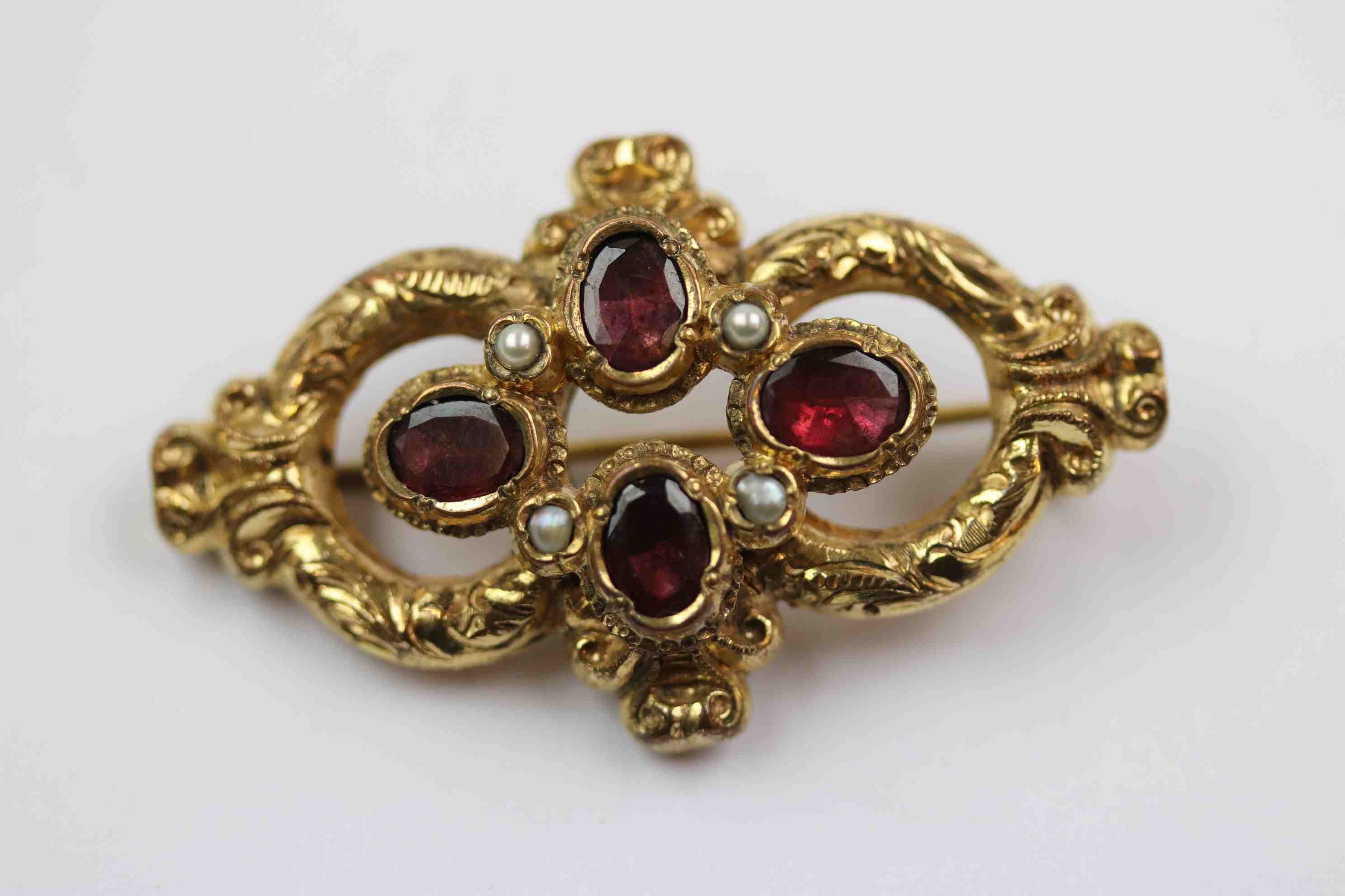 19th century garnet and seed pearl yellow metal brooch, four oval mixed cut garnets in quatre foil - Image 3 of 6