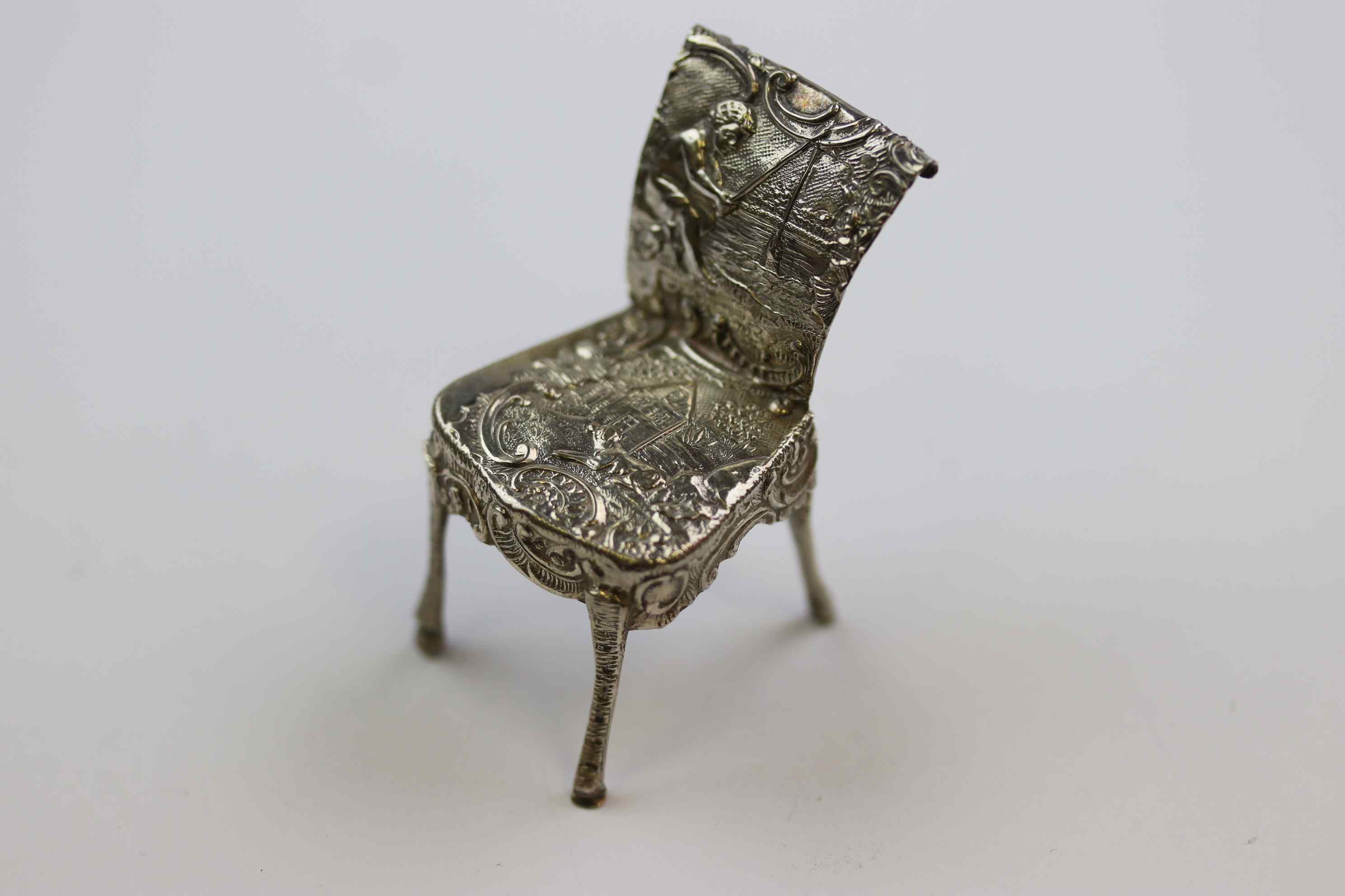 Dutch silver novelty miniature chair with repousse idyllic cottage and dog scene to seat and boy - Image 6 of 6