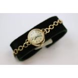 Ladies Tudor 9ct yellow gold wristwatch, champagne dial and subsidiary dial, gilt Arabic numerals,