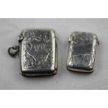 Late Victorian silver vesta case, engraved scroll decoration with blank cartouche to centre,