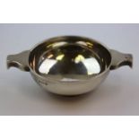 George V silver quaiche of plain polished form, dognose shaped handles, makers A Wilcox,