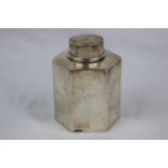 Early George V silver tea caddy of plain polished hexagonal form, makers William Neale & Son Ltd,