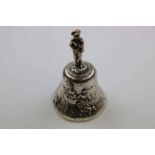 Late Victorian silver hand bell, the handle modelled as a country boy with violin, the body with