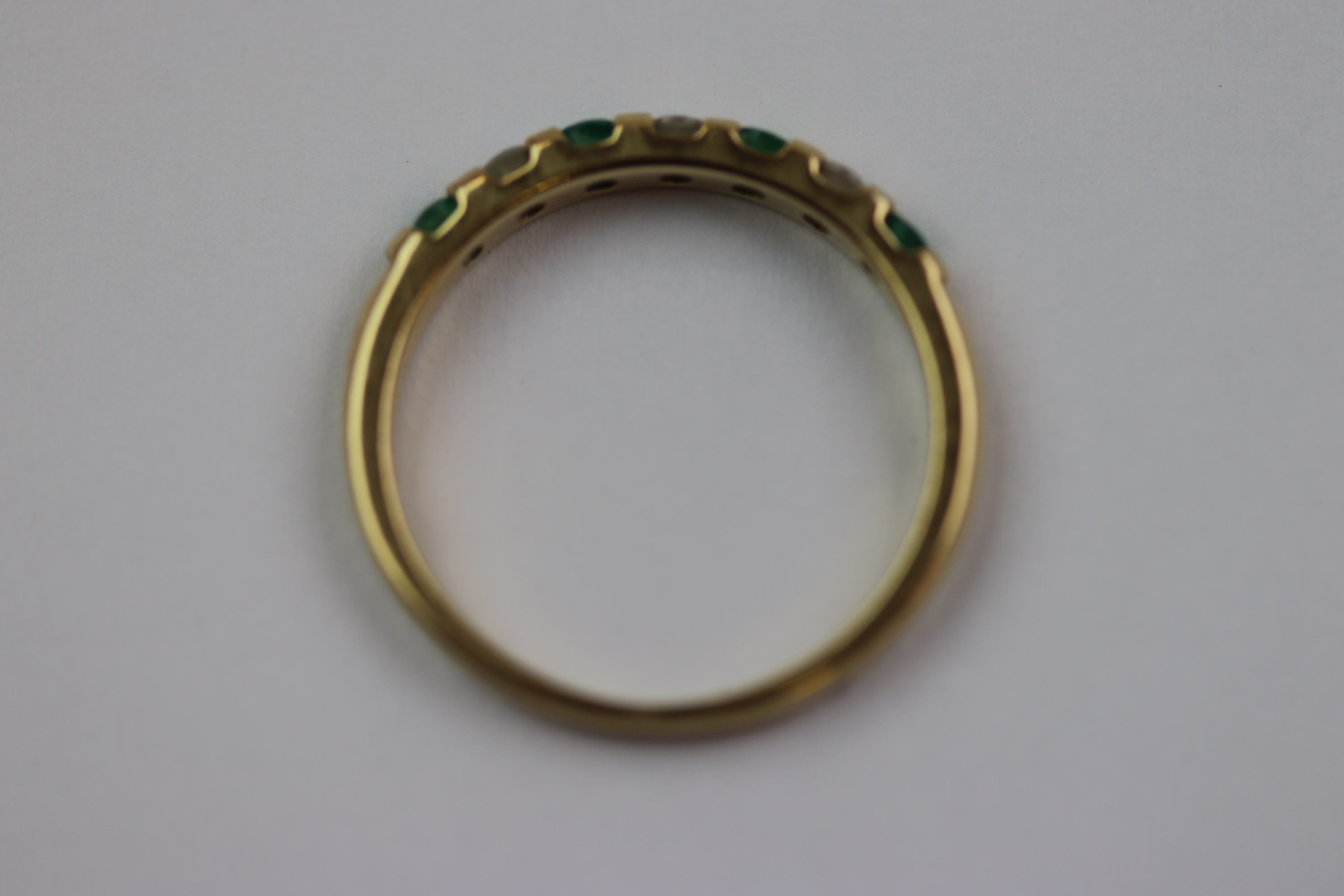 Emerald and diamond seven stone 9ct yellow gold dress ring, four small round mixed cut emerald and - Image 6 of 10