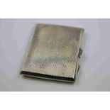 Geroge V silver cigarette case engine turned decoration and initialled square cartouche to corner,