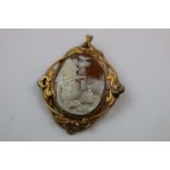 Victorian gilt metal cameo pendant brooch, the conch shell cameo depicting 18th century cottage