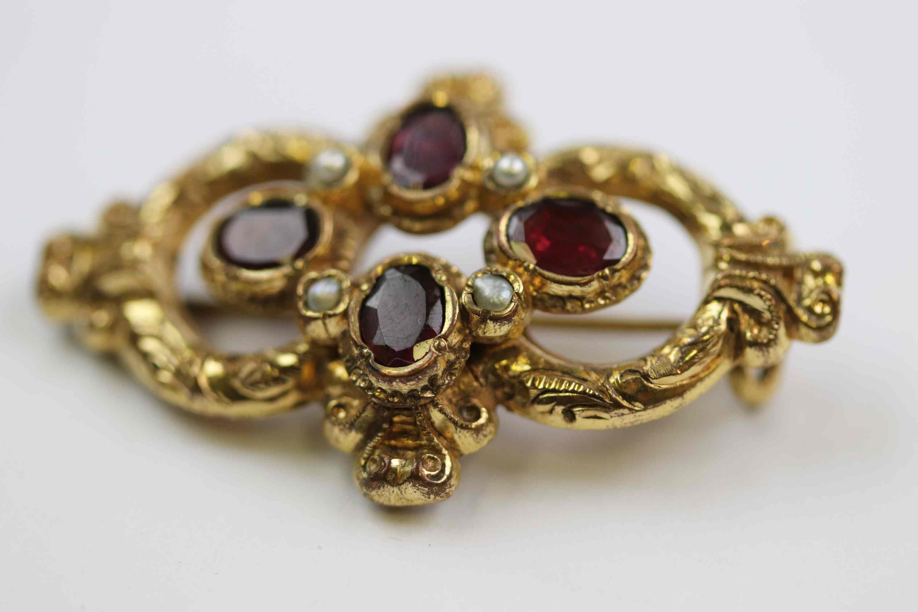 19th century garnet and seed pearl yellow metal brooch, four oval mixed cut garnets in quatre foil - Image 4 of 6