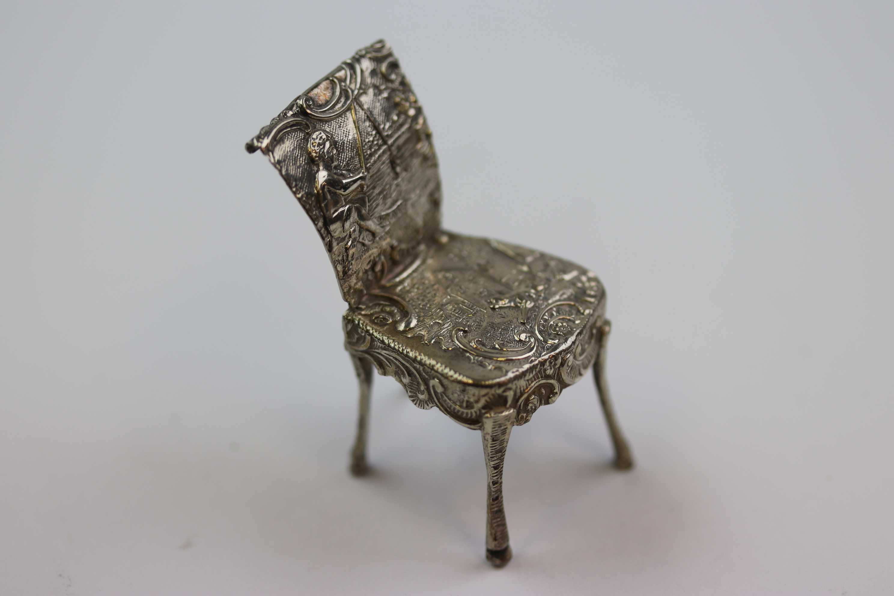 Dutch silver novelty miniature chair with repousse idyllic cottage and dog scene to seat and boy - Image 3 of 6