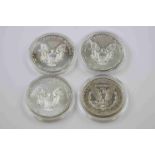 Four encapsulated Silver USA Dollars to include 2 x 2011 Fine Silver, 2012 Fine Silver & 1888, all