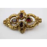 19th century garnet and seed pearl yellow metal brooch, four oval mixed cut garnets in quatre foil