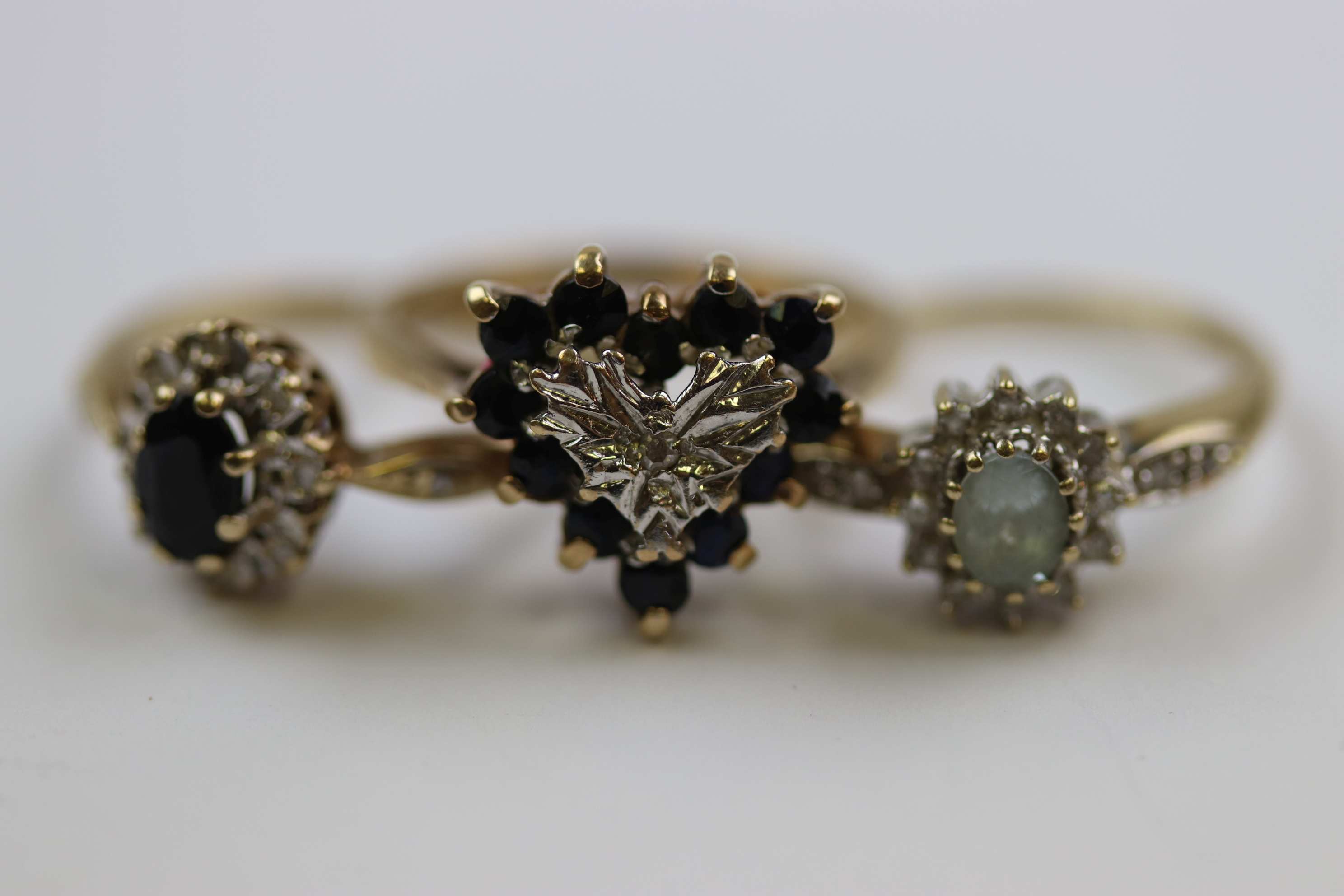 Three gem set 9ct yellow gold dress rings comprising diamond and sapphire heart shaped fancy cluster - Image 2 of 13