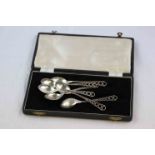 Set of six Edwardian silver coffee spoons, openwork terminals with graduated circle design, makers E