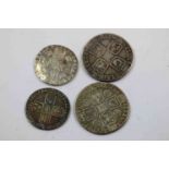 Four Silver coins to include a George I Shilling 1720, George II Shilling 1743, George II Sixpence