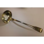 George III silver ladle with oval bowl, fiddle pattern, crested terminal, the tongue initialled JFOH