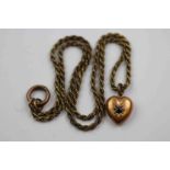 Victorian sapphire 15ct rose gold heart shaped pendant, the small round mixed cut sapphire gypsy set