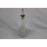 Silver collared cut glass decanter of bulbous form with tapered neck, makers Alexander Clark & Co