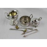 Collection of silver comprising an Edwardian silver cream jug of octagonal form raised on