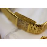 Ladies 18ct yellow gold Omega wristwatch, the square face with textured gold dial, gold baton