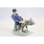 Royal Copenhagen Figure of a Boy holding a Calf, model no 772, 17cms high