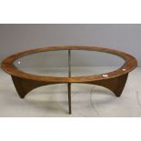 Mid 20th century G-Plan Teak and Glass Atomic ' Astro ' Oval Coffee Table, 122cms x 66cms x 42cms