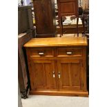 Pine Dresser Base with Two Drawers above Two Cupboards with Iron and Ceramic Handles, 100cms long