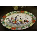 Contemporary Chinese Oval Plate decorated with Figures on a Boat, red square mark to back, 35cms