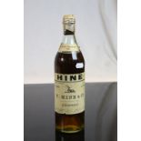 Bottle of Hine Grande Champagne 1914 cognac, foil semi-removed