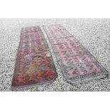 Pair of Persian Baluchi Woollen Runners, Geometric Pattern on a Red Ground, approx. 420cms x 93cms