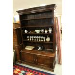 19th century Mahogany Bookcase with four adjustable shelves and Two Door Cupboard below, approx.