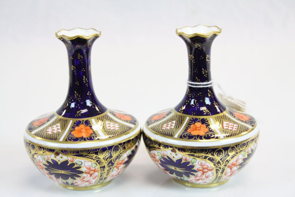 Pair of Royal Crown Derby Imari Small Bottle Neck Vases, pattern no. 1335 / 1128, 11.5cms high