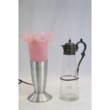 Victorian Etched Glass Claret Jug with Pewter Mounts together with a Table Lamp with Pink Glass