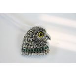 Silver Brooch in the form of a Bird of Prey with Emerald Collar and Glass Eyes