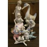 Lladro Figure of a Child with Polar Bear model no. 5238, Nao Figure of a Girl Yawning, Two Nao