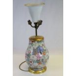 Chinese Ceramic Four Branch Table Lamp profusely decorated with enamelled flowers on a gilt ground