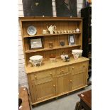 Ash / Pine Dresser, the upper section with Two Shelves above Three Drawers and Three Cupboards,