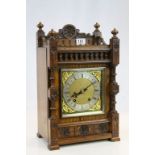 Late 19th century Winterhalder & Hofmeier Carved Oak Cased Bracket Clock with Brass Dial and