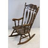 Mid 20th century Beech Rocking Chair with Carved Top Rail