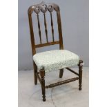 Gothic Style Bedroom Chair, the back rail with pierced carved shamrocks, turned spindles, padded