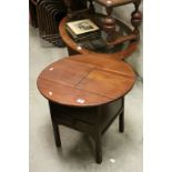 Early to Mid 20th century Mahogany Circular Sewing Table with Two Slide Back Doors to top and Drawer