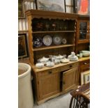 Victorian Pine Dresser, the upper section with Two Shelves above Two Drawers and Two Cupboard with