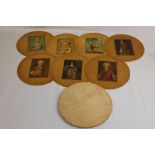 Seven 19th century handpainted miniature portraits on card, depicting 18th century boys and girls,