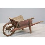 Antique Wooden Wheelbarrow with Iron Spoke and Banded Wheel, 100cms long.