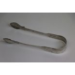 George IV pair of silver fiddle pattern sugar tongs, initialled bridge, makers William Bateman II,