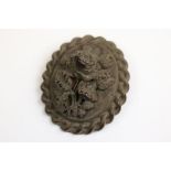 Victorian bog oak oval brooch, roses carved in relief to centre with rope twist border, hinged pin